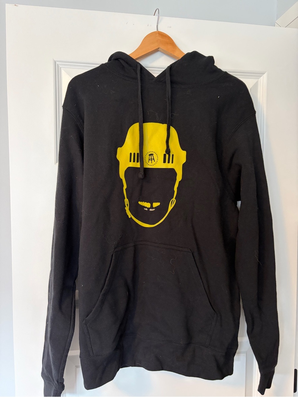 Black Hoodie with Yellow Helmet Graphic